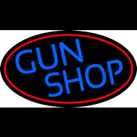 Blue Gun Shop With Red Round Neon Sign